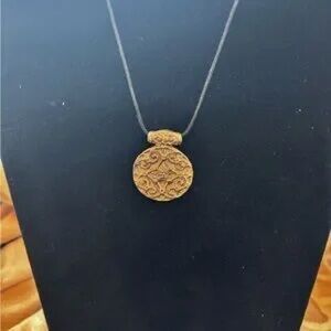 Intricate Gold Pendant Necklace